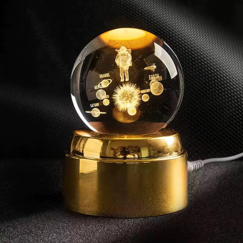 Esfera de cristal giratoria