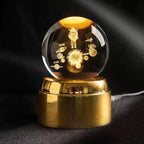 Esfera de cristal giratoria