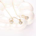 Set cadena + aretes corazón