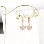 Set cadena + aretes corazón
